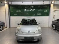 Usado VW New Beetle 102 CV (75 kW) 2002 Gris / plata Utilitario