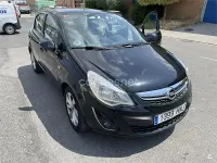 Usado Opel Corsa Selective 100 CV (73 kW) 2012 Negro Utilitario
