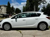 Używany Opel Astra Excellence 110 KM (80 kW) 2015 Biały Sedan/Limuzyna