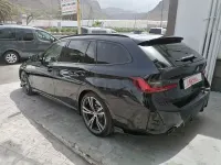 Usado BMW 320e 204 CV (150 kW) 2023 Negro Familiar