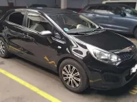 Usado Kia Rio 84 CV (61 kW) 2013 Negro Utilitario