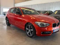 Usado BMW 116 Sport Line 136 CV (100 kW) 2012 Naranja Utilitario