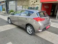Używany Toyota Auris Active 132 KM (97 kW) 2014 Beżowy Sedan/Limuzyna
