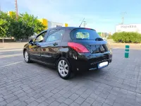 Usado Peugeot 308 Active 112 CV (82 kW) 2012 Marrón Berlina