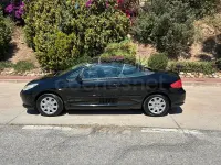 Usado Peugeot 307 CC 110 CV (80 kW) 2006 Negro Descapotable