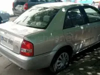 Usado Mazda 323 Exclusive 100 CV (73 kW) 2002 Gris / plata Berlina