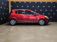 Usado Opel Corsa Selective 85 CV (62 kW) 2013 Naranja Berlina