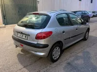 Usado Peugeot 206 60 CV (44 kW) 1999 Gris / plata Utilitario