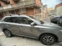 Usado Mitsubishi Outlander P-HEV 203 CV (149 kW) 2015 Gris / plata SUV