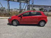 Usado Fiat Punto Evo Dynamic 69 CV (50 kW) 2012 Rojo Utilitario