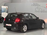Usado BMW 118 143 CV (105 kW) 2009 Negro Utilitario
