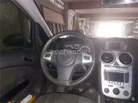 Usado Opel Corsa Selective 75 CV (55 kW) 2013 Negro Utilitario