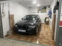 Usado BMW 118 122 CV (89 kW) 2007 Negro Utilitario