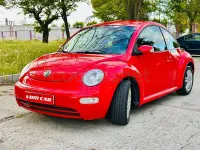 Usado VW New Beetle 102 CV (75 kW) 2006 Rojo Utilitario