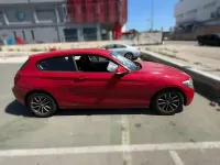 Usado BMW 116 116 CV (85 kW) 2013 Rojo Utilitario