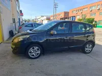 Usado Renault Scénic III 110 CV (80 kW) 2012 Negro Monovolumen