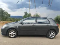 Usado Toyota Corolla Sol 90 CV (66 kW) 2002 Gris / plata Berlina