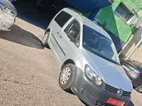 Usado VW Caddy Comfortline 105 CV (77 kW) 2012 Gris Monovolumen