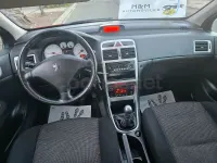Usado Peugeot 307 110 CV (80 kW) 2007 Granate Berlina