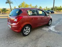 Usado Opel Corsa Selective 85 CV (62 kW) 2013 Rojo Utilitario