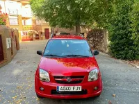 Usado Suzuki Ignis 69 CV (50 kW) 2007 Rojo Utilitario
