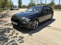 Usado BMW 318 143 CV (105 kW) 2015 Negro Familiar