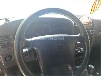 Usado SsangYong Korando 100 CV (73 kW) 1999 Gris / plata SUV
