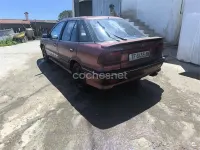 Usado Mitsubishi Lancer Sportback Invite 109 CV (80 kW) 2008 Granate Berlina