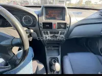 Usado Nissan Almera 98 CV (72 kW) 2005 Gris / plata Berlina