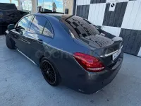Usado Mercedes C250 AMG line 204 CV (150 kW) 2015 Gris / plata Berlina