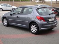 Usado Peugeot 207 69 CV (50 kW) 2010 Gris Utilitario