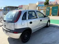 Usado Opel Corsa 65 CV (47 kW) 2003 Gris Utilitario