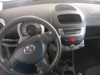 Usado Toyota Aygo 68 CV (50 kW) 2007 Gris / plata Utilitario
