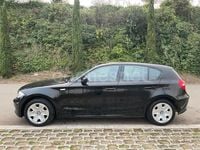 Usado BMW 116 122 CV (89 kW) 2010 Negro Utilitario
