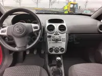 Usado Opel Corsa Essentia 85 HP (62 kW) 2012 Vermelho Citadino