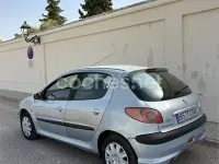 Usado Peugeot 206 70 CV (51 kW) 2004 Gris / plata Berlina