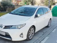 Usado Toyota Auris Hybrid Advance 136 CV (100 kW) 2013 Blanco Familiar