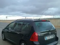 Usado Peugeot 307 110 CV (80 kW) 2006 Negro Familiar