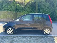 Usado Mitsubishi Colt Inform 95 CV (69 kW) 2005 Negro Utilitario