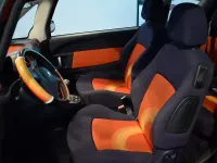 Usado Peugeot 1007 70 CV (51 kW) 2007 Rojo Monovolumen