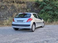 Usado Peugeot 207 73 CV (53 kW) 2010 Gris Utilitario