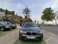Usado BMW 118 Sport Line 143 CV (105 kW) 2012 Gris / plata Utilitario