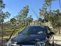 Używany Opel Astra Cosmo 110 KM (80 kW) 2010 Czarny Sedan/Limuzyna
