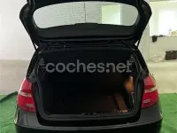 Usado BMW 118 143 CV (105 kW) 2009 Negro Utilitario