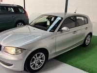 Usado BMW 118 143 CV (105 kW) 2009 Gris / plata Utilitario