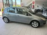 Usado Opel Corsa 86 CV (63 kW) 2010 Plateado Utilitario