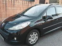 Usado Peugeot 207 92 CV (67 kW) 2010 Negro Familiar