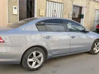 Usado VW Passat 105 CV (77 kW) 2012 Gris / plata Familiar