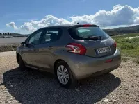 Usado Peugeot 208 Allure 68 CV (50 kW) 2013 Marrón Utilitario