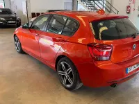 Usado BMW 116 Sport Line 136 CV (100 kW) 2012 Naranja Utilitario